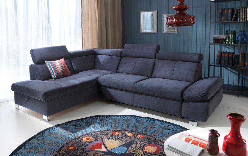 Navy fabric four seater sofa with recliner option.