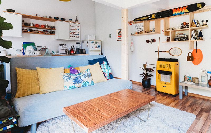 Light blue sofa in contemporary small apartment.