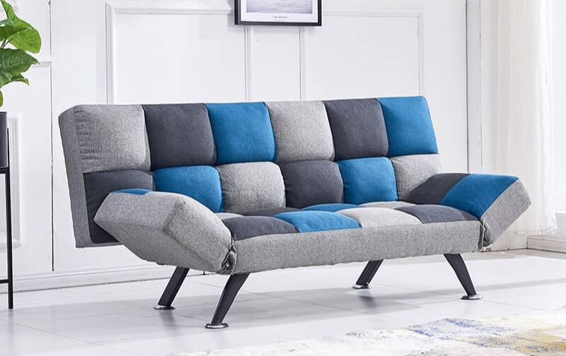 Contemporary sofa bed with patchwork pattern.