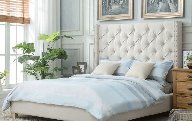 Tufted ivory quilted bedframe.