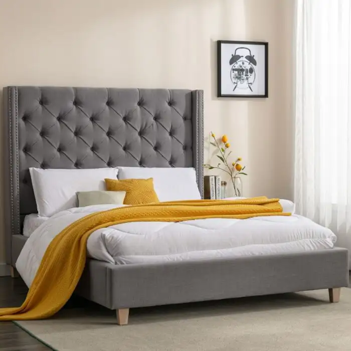 Tall grey store upholstered bed