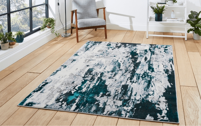 a rug on a wood floor