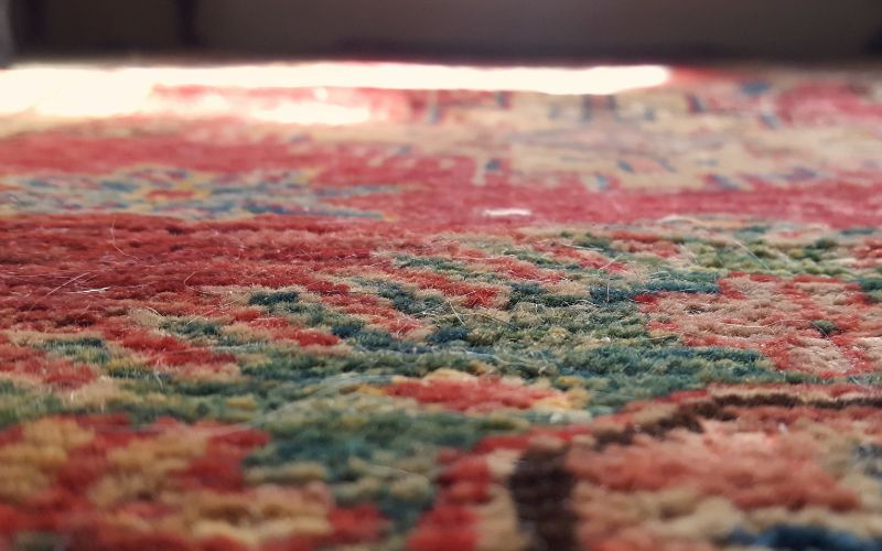 close up of a red persian rug