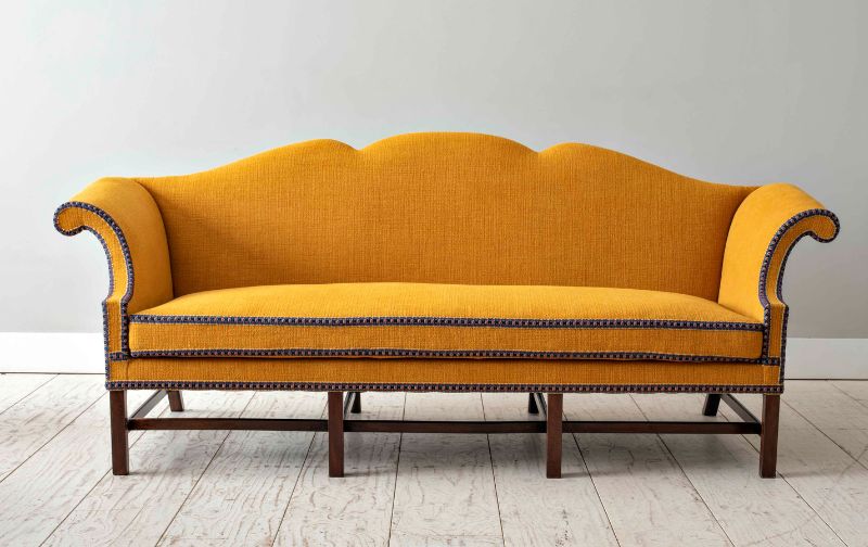 yellow camelback sofa