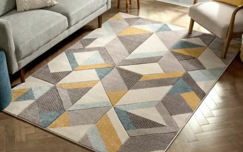 a geometric rug on the floor