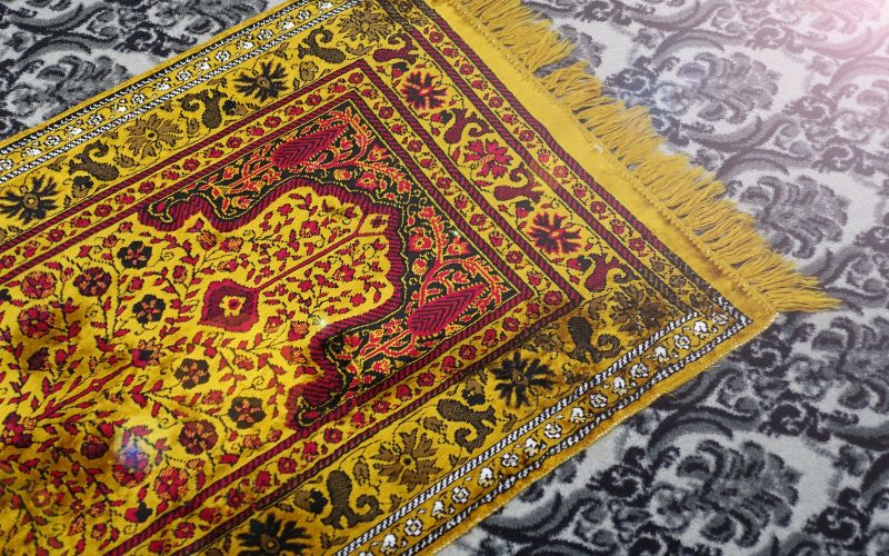 a prayer rug on the ground