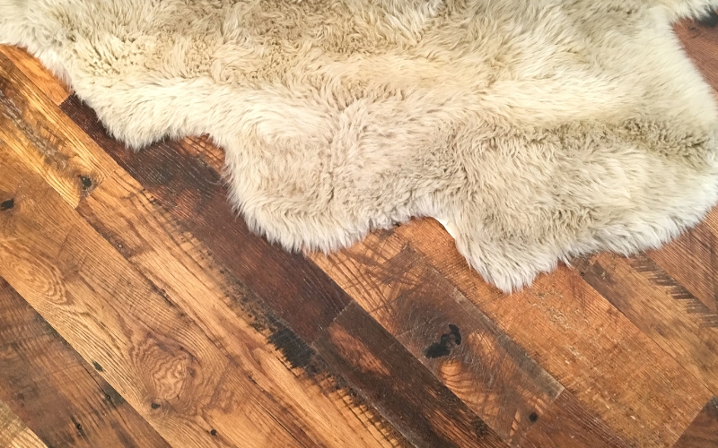 types of rugs in the bedroom showing sheepskin rug