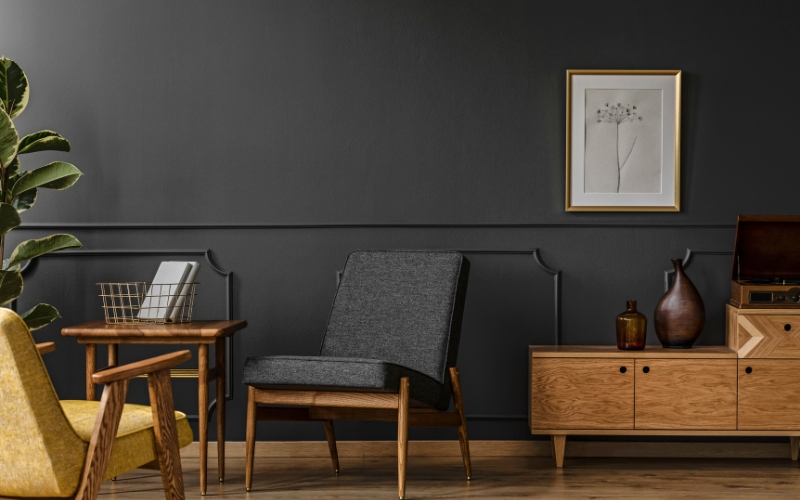 a wooden chair and table in a room